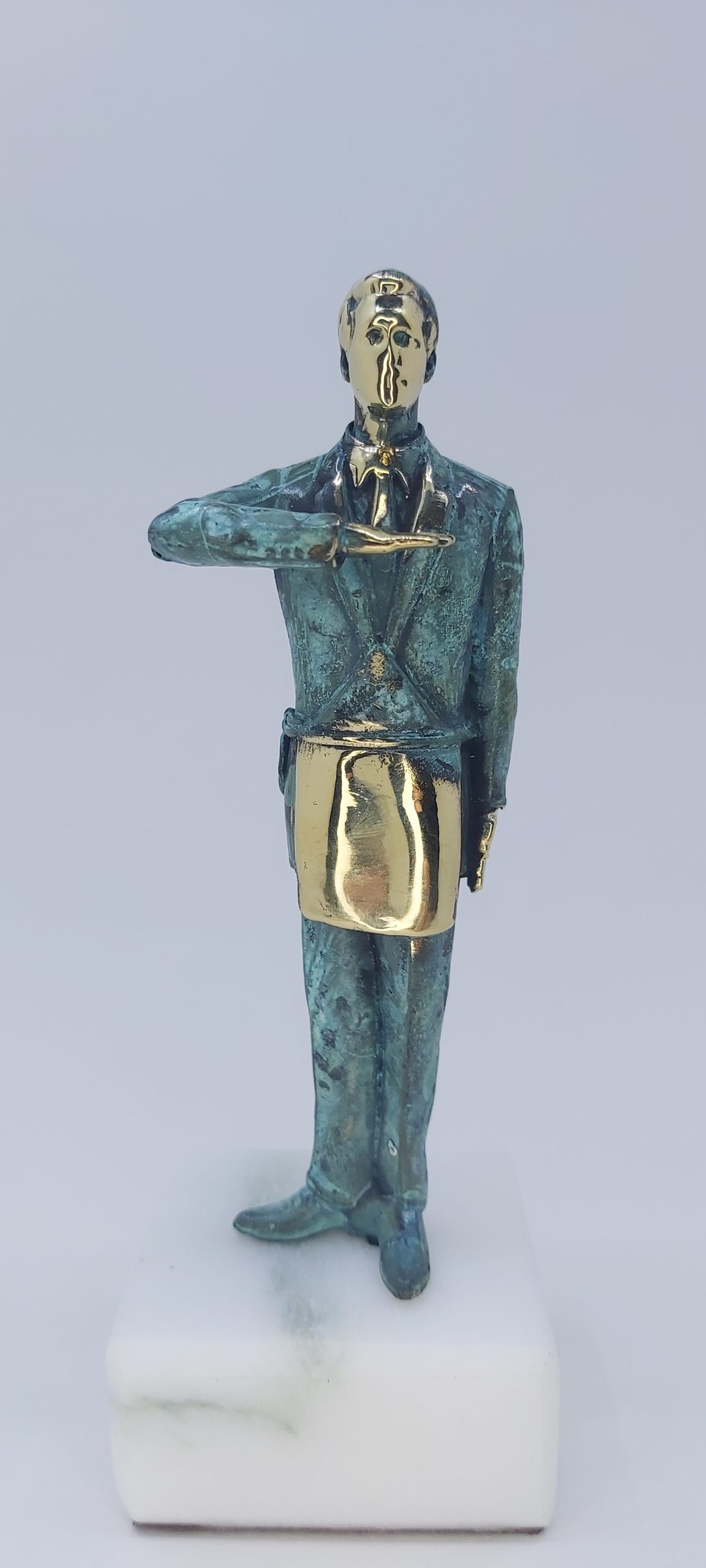 A degree masonic rusted bronze statue